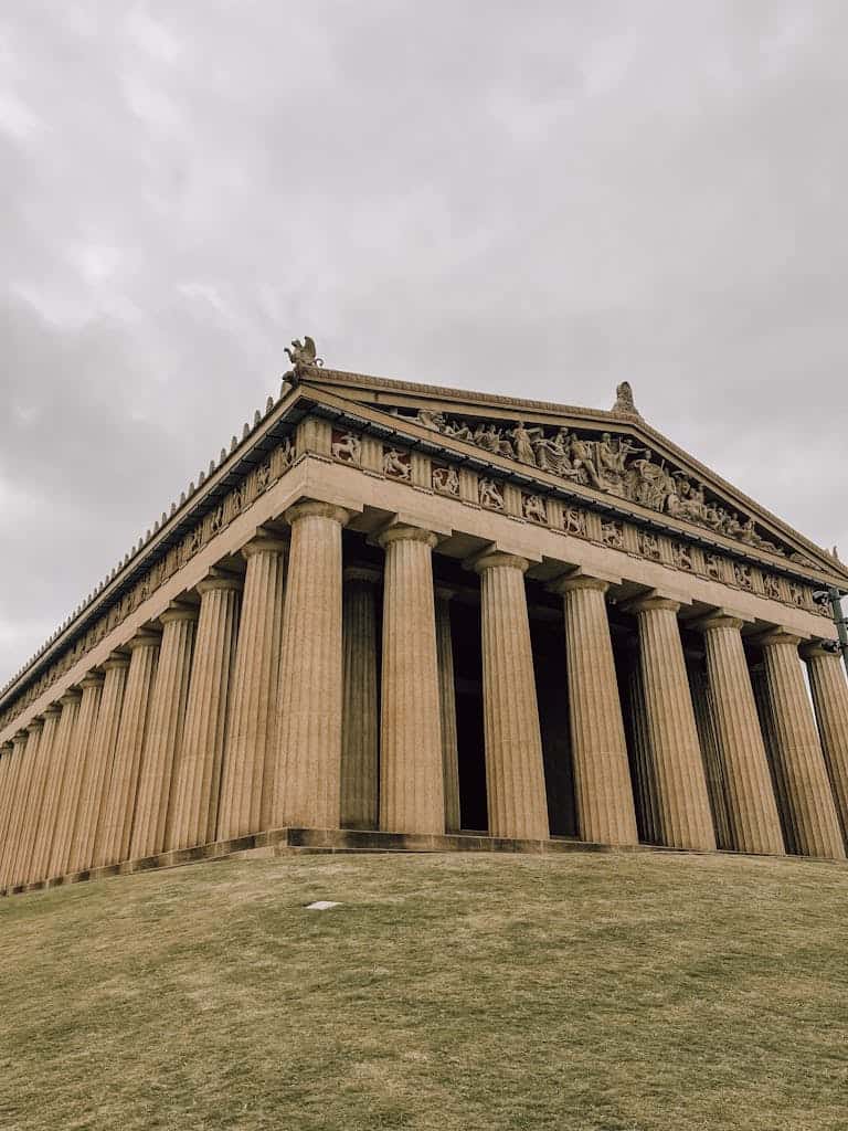 The Parthenon in Nashville captures the majesty of ancient Greek architecture on a cloudy day.